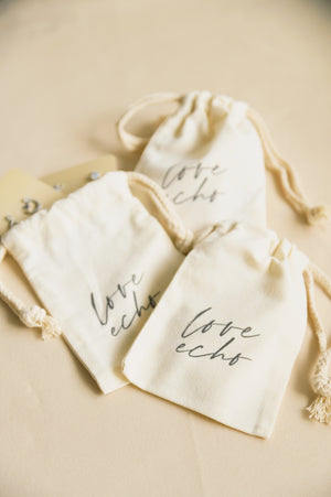 
            
                Load image into Gallery viewer, Love Echo Linen Drawstring Pouch
            
        